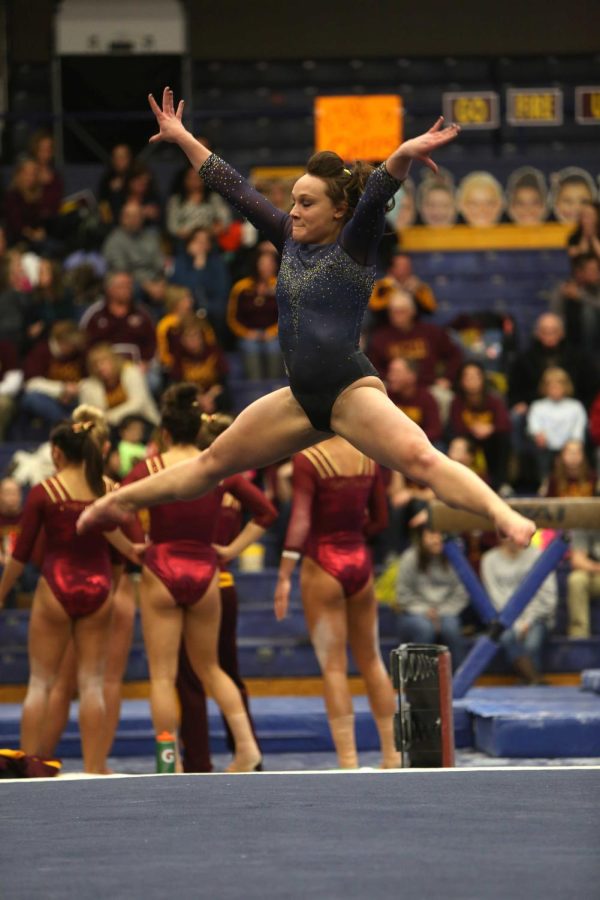 Current junior Skyelee Lamano during her floor routine at a home meet against Central Michigan State. The Flashes lost the meet 195.325 to 196.400. Feb. 15, 2015.