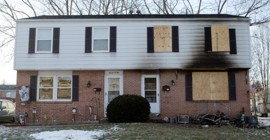 A stove fire caused the char to the front of a duplex in Kent, Ohio, on Tuesday, Jan. 19, 2016. The fire started around 9:15 a.m at 704 Silver Meadows Blvd. Both families were present in the duplex. Mrs. King, the next door neighbor who has resided in the duplex for 32 years, said the two individuals have been moved out of their residence.