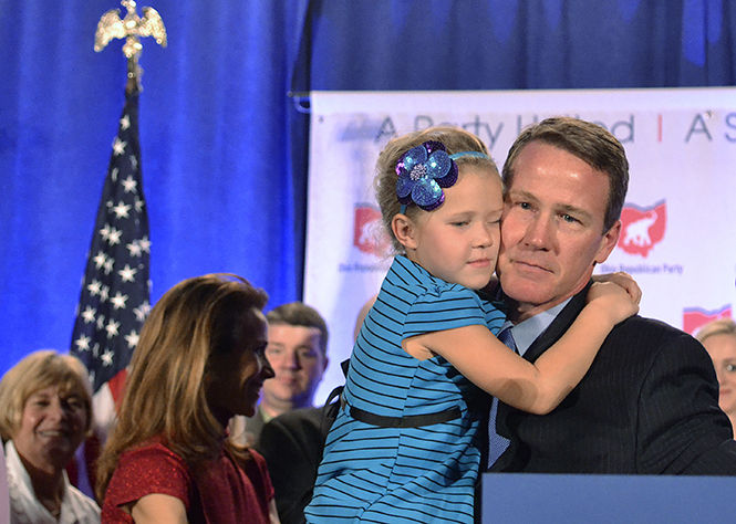 Ohio+Secretary+of+State+Jon+Husted+celebrates+his+re-election+with+his+daughter+at+the+Republican+Watch+party+in+Columbus+on+Election+night%2C+Tuesday%2C+Nov.+4%2C+2014.
