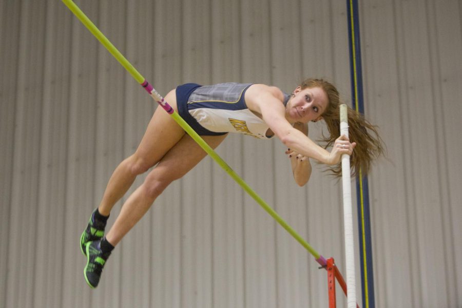Junior Morgan Estes competes in the pole vault during a dual meet vs. Akron at the Kent State Fieldhouse. Estes holds the school record for indoor pole vault at 13’-05.25”. The Flashes fell to Akron 81-70 on Friday, Jan. 22, 2016.