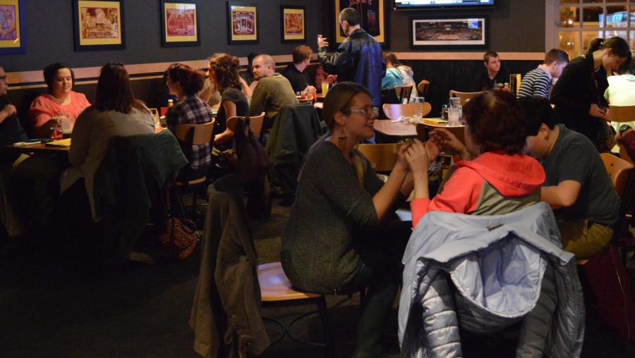 People attending Deaf Night Out wait for their food at downtown Kent’s Buffalo Wild Wings on Feb 3. 2016.
