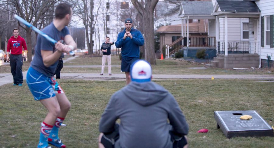 Senior integrated science major Michael Millard gets ready to pitch during a Super Bowl party on Summit Street on Sunday Feb. 7, 2016.