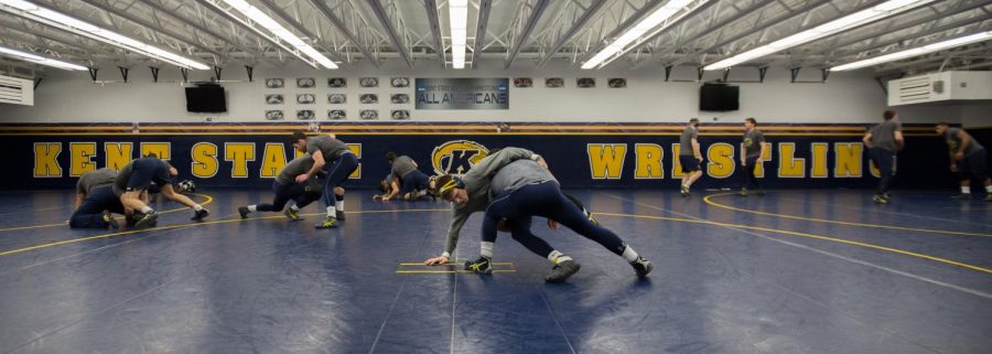 Members of the Kent State wrestling team run drills during practice in the M.A.C. Annex on Tuesday, Feb. 2, 2016. The team will take on Northern Illinois University on Friday, Feb. 5, 2016.