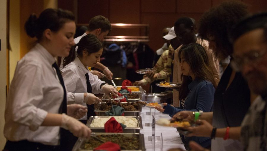 Catering+staff+serve+attendees+during+KASA%E2%80%99s+African+Night+held+in+the+Student+Center+Ballroom+on+Friday%2C+March+11%2C+2016.
