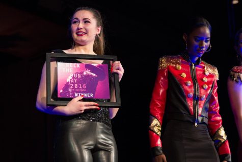 Designer Kelly Nieser accepts her award after she is announced the winner of Rock The Runway 2016 on Saturday, Mar. 5, 2016. The winning designer gets a scholarship that covers half of their fall tuition.