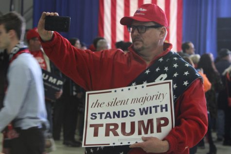 A Trump supporter takes a selfie at the Donald Trump really at Port-Columbus International Airport in Columbus, Ohio, on Tuesday, Mar. 1, 2016.