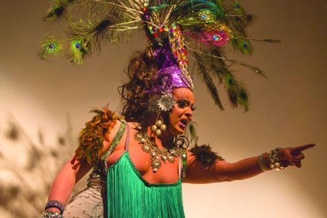 A drag queen preforms at Green with envy, a drag show put on by the Delta Lamda Phi fraternity. The show was held in the KIVA to raise money for the LGBTQ community scholarships. March 2 2015.