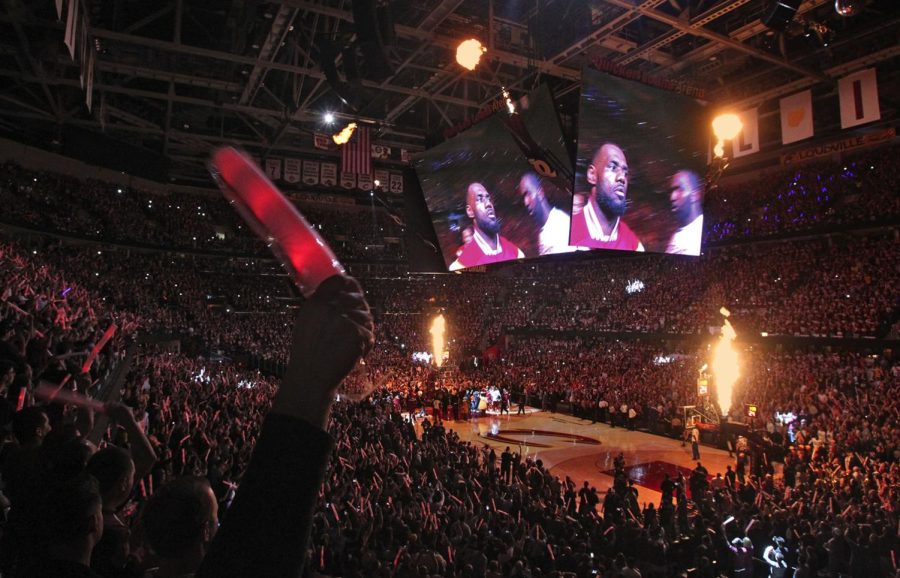 Cleveland Cavaliers fans cheer as LeBron James is introduced before the start of Game 3 of the NBA Finals against the Golden State Warriors at Quicken Loans Arena in Cleveland on Tuesday, June 9, 2015.
