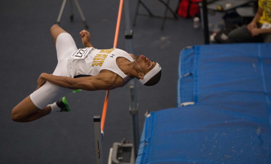 Senior Donovan Tolbert competes in the high jump during the MAC Indoor Track and Field Championship at Stile Athletic Field House on Saturday, Feb. 27, 2016.