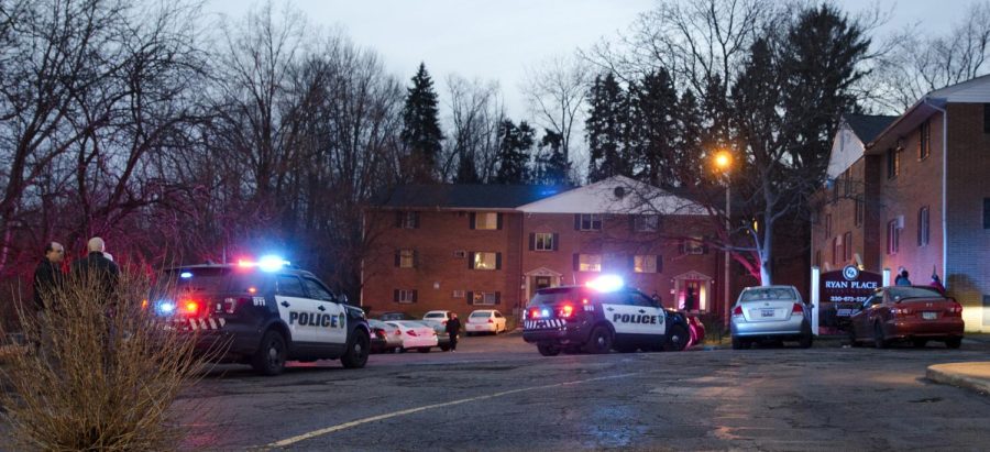 Police and investigators on the scene at the Ryan Place apartment complex on Sunday, Feb. 7, 2016, following the shooting death of a Kent State freshman. The fourth suspect in the homicide, 17-year-old Anton Planicka, has pleaded not guilty to six felony charges.