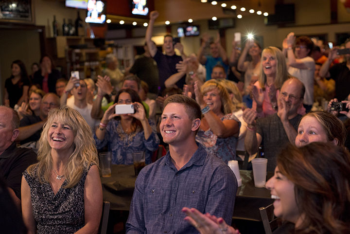 Kent States Eric Lauer , his mother, Carole, left and his sister and girlfriend and large crowd of excited supporters react after Lauer is chosen 25th overall in the first round of the MLB draft by the SanDiego Padres. The draft party was held at Aces bar and grill in North Ridgeville, Ohio, on Thursday, June 9, 2016.