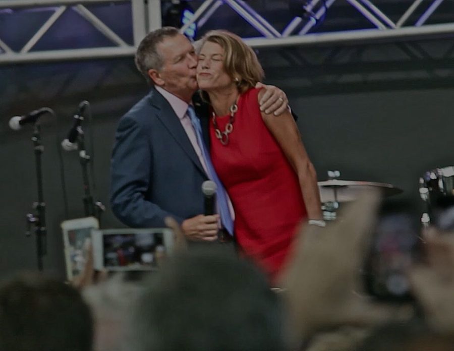 John Kasich kisses his wife before speaking to supporters at the Rock and Roll Hall of Fame in downtown Cleveland on Tuesday, July 19, 2016.