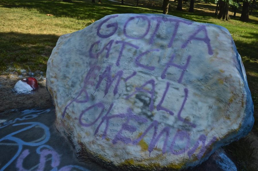 The Rock on Kent States main campus sits spray painted with the Pokemon tag line gotta catch em all on its surface on Wednesday, July 13, 2016. 