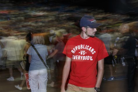 Alex Miller, of Akron, displays his shirt that reads “Republicans vs everybody” at the Trump rally in Akron on Monday Aug. 22, 2016.