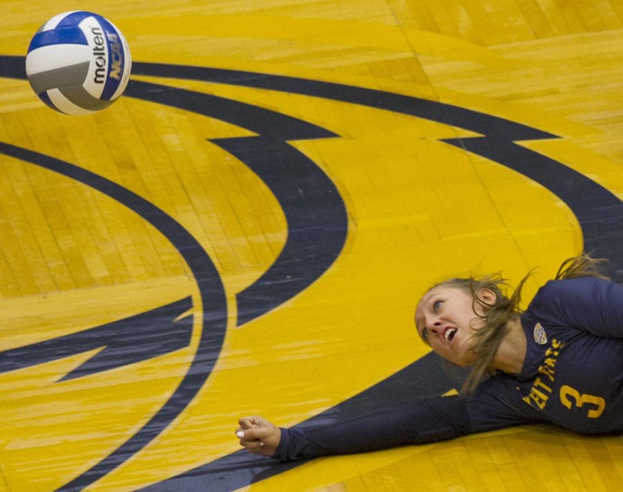 Junior Challen Geraghty dives for the ball against Robert Morris University on Tuesday, Sept. 6, 2016 at the M.A.C. Center. Kent State won, 3-0. Friday nights game ended with the Flashes losing their five-game win streak to the University of Miami RedHawks, 3-0.