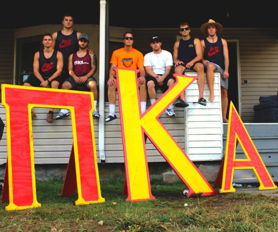 Members+of+the+Kent+State+Fraternity+Pi+Kappa+Alpha+pose+with+their+letters+in+front+of+their+new+home+locatoin+on+239+College+Street%2C+Sept+7%2C+2016.