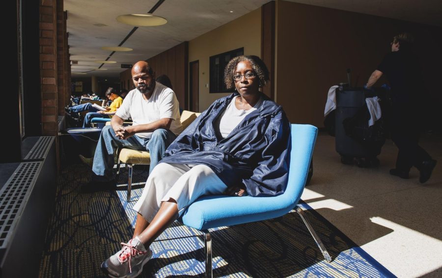 Former Kent State employee Maurice Holden and his wife Carol Holden sit on the second floor of the Student Center on Tuesday, Sept. 20, 2016. The couple are currently homeless and have a GoFundMe to raise money for housing. 