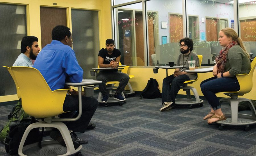 Students take part in the International Conversation Hour at the Kent State University Library's Writing Commons on Thursday, Sept. 29, 2016.