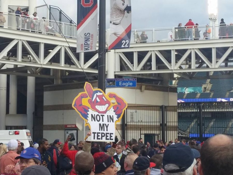 A+Cleveland+Indians+Not+in+my+tepee+sign+is+raised+above+the+crowd+gathered+outside+Progressive+Field+in+Cleveland%2C+Ohio%2C+during+Game+1+of+the+World+Series+on+Tuesday%2C+Oct.+25%2C+2016.%C2%A0