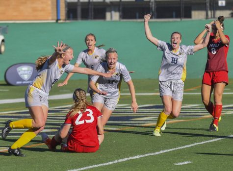 The Kent State soccer team celebrates after its first goal in the MAC Championship game against Northern Illinois University on Sunday, Nov. 6, 2016. The Flashes would go on to win the championship, 1-0.