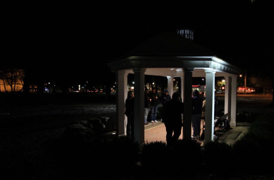 Kent State students, faculty and community members gather at the gazebo on the front of the main campus on Monday, Nov. 21, 2016 to remember the transgender lives that were lost in 2016. The student organization Trans*Fusion hosted the event a day after the national Transgender Day of Remembrance.