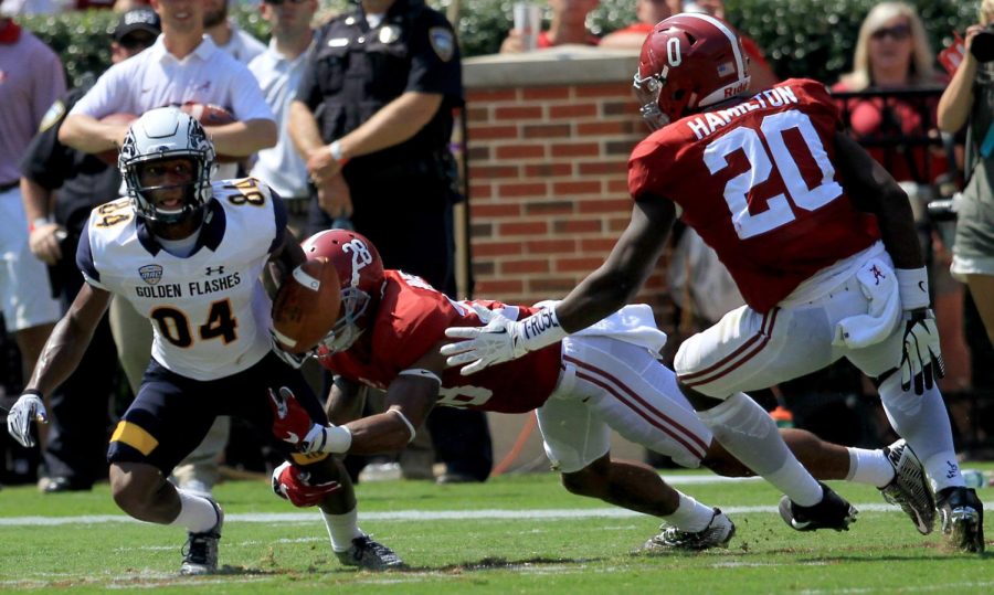 Freshman+widereceiver+Kavious+Price+is+tacked+by+the+University+of+Alabama%E2%80%99s+Crimson+Tide%E2%80%99s+junior+redshirt+defensive+back+Anthony+Averett+during+a+play+in+a+game+at+Bryant-Denny+Stadium+on+Saturday%2C+Sept.+24%2C+2016.+The+Flashes+lost+48-0.