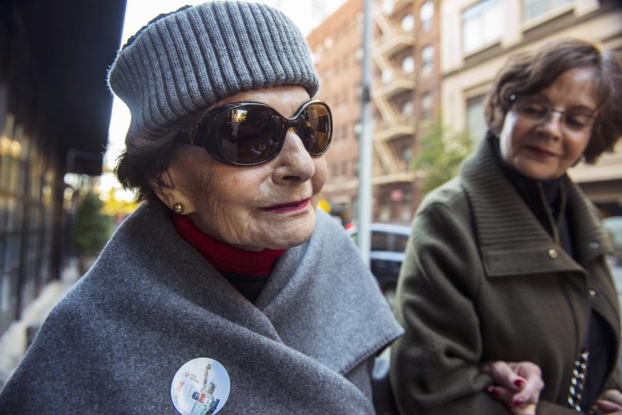 Helen Stein of Sea Gate, Brooklyn, New York walks to lunch with her daughter Nina Stein-Wolf after voting at the Estelle R. Newman Center in New York City on Tuesday, Nov. 8, 2016. “I won’t tell you who I voted for… but it wasn’t Trump,” she said with a smile. Helen is 103 years-old and recalls the first time she voted in the presential election, when Franklin Delanor Roosevelt ran for office.