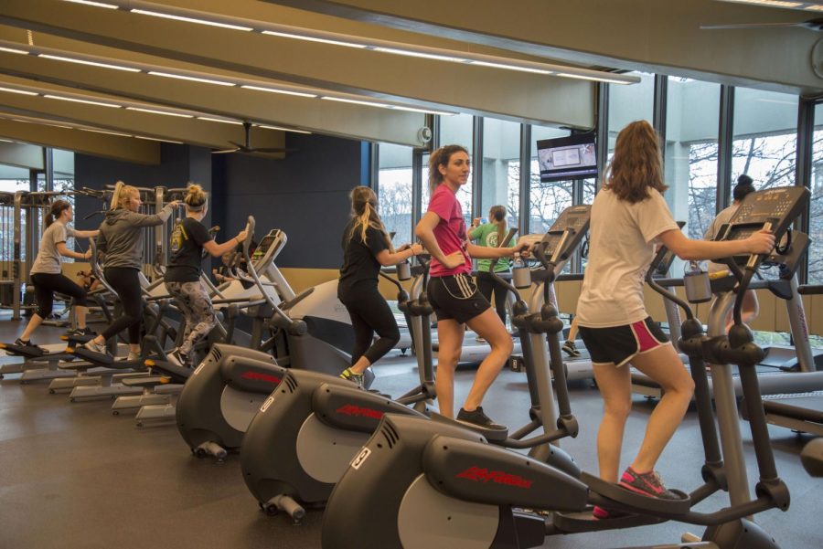 Kent State students fill the new Tri-Towers gym at the opening on Tuesday, Jan. 17, 2017. An addition to the Recreation and Wellness Center on the other side of campus, the new center will make working out more convenient for students.