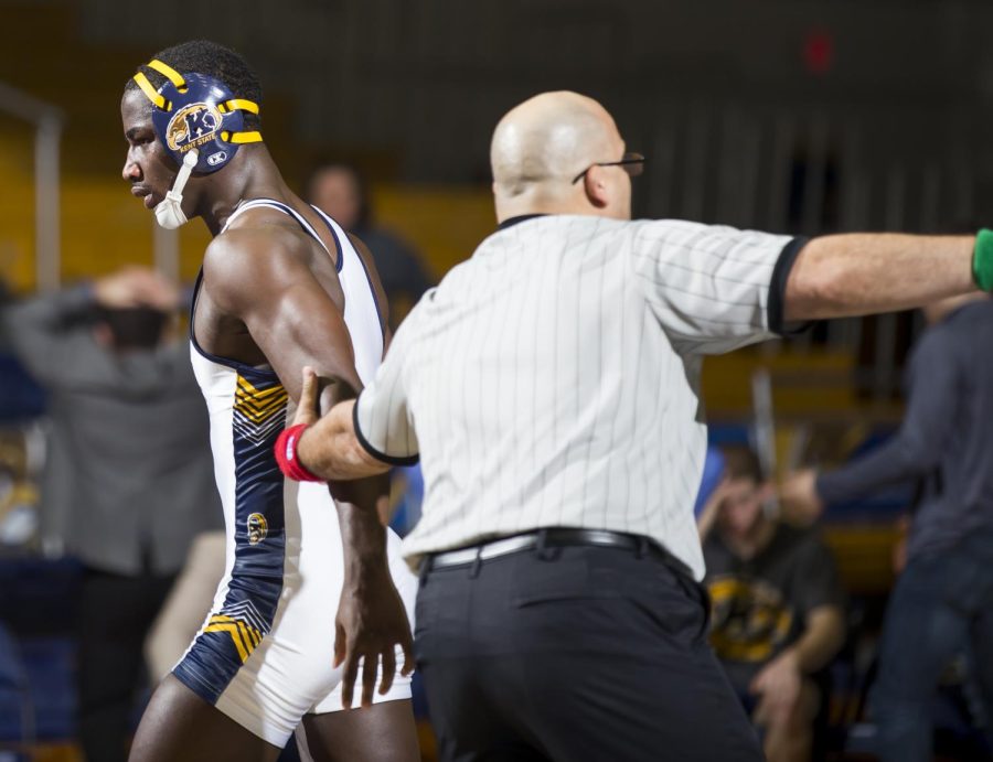 Former Kent State wrestler Jairod James walks away after punching Ohio red-shirt sophomore Arsen Ashughyan in face at the M.A.C. Center on Sunday, Jan. 22, 2017. James was disqualified from the match. Kent lost 2-43.