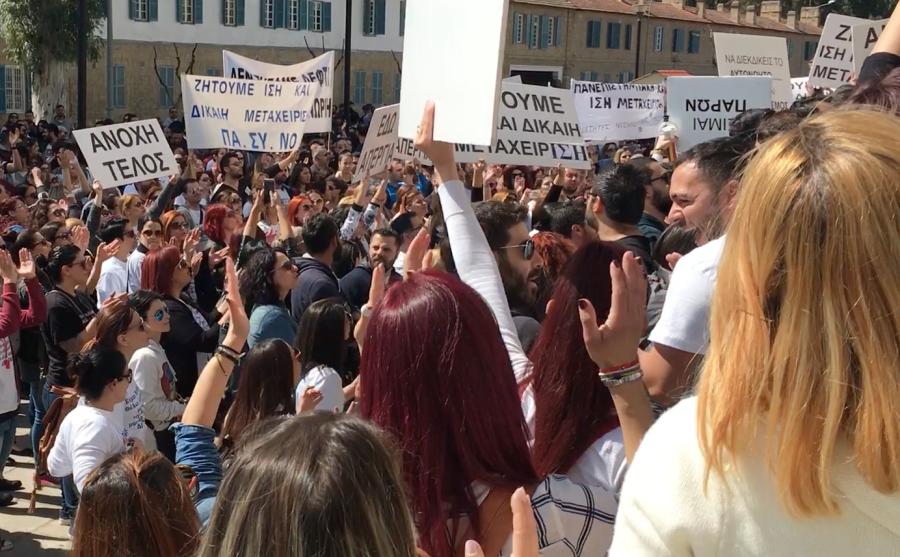 Nurses gather at the Cypriot Parliaments House of Representatives to demand changes to higher education policies.