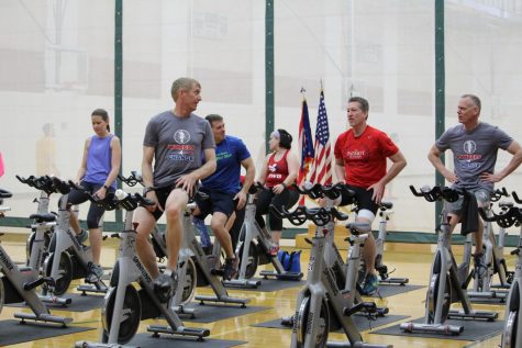 Veterans use the exercise bicycles at the Remembrance Day fitness event at the Recreational and Wellness Center on Saturday, Feb. 25, 2017. 