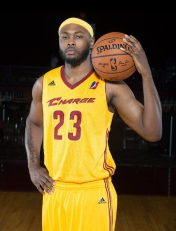 Evans posing for a photo shoot in 2016-17, his first season with the Charge.