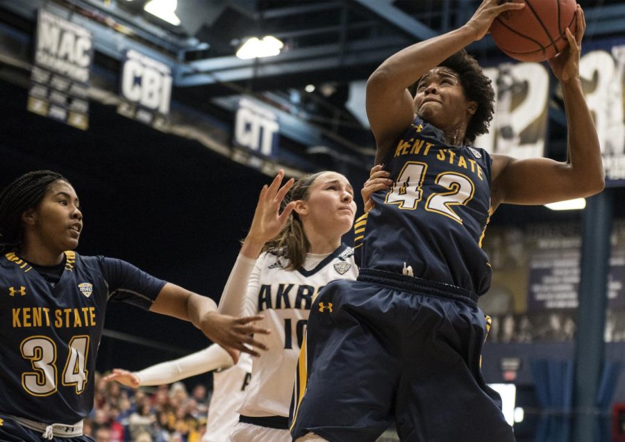 Kent State senior forward Chelsi Watson comes down with the offensive rebound against the Akron Zips at the James A. Rhodes Arena on Saturday, Feb. 11, 2017. The Flashes won the rivalry game, 72-58.