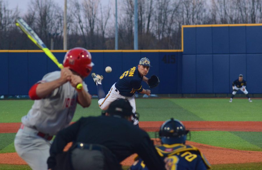 Red-shirt senior right hand pitcher Eli Martin pitches a strike against a player from Youngstown State University Wednesday April 13, 2016. The Flashes would go on to win 5-2.
