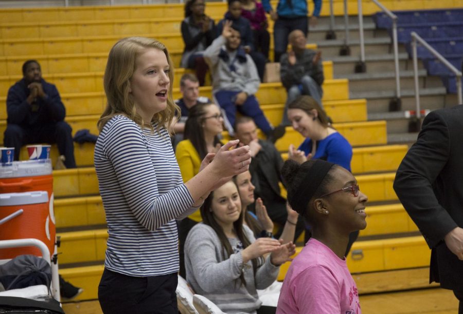 Bridget Looney a junior and student manager for the Kent State women’s basketball team, cheers on the Flashes at the game against The University of Akron in the M.A.C. Center, Saturday, Feb. 25, 2017. The Flashes won 73-69.