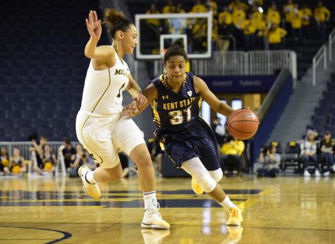 Redshirt freshman guard Megan Carter drives to the basket against the University of Michigan at the Crisler Center in Ann Arbor, Michigan, on Thursday, March 16, 2017. Kent State lost in the first round of the WNIT Tournament, 67-60.