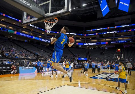 UCLA freshman guard Lonzo Ball attempts a dunk during the Bruins open practice at the Golden 1 Center in Sacramento, California, on Thursday, March 16, 2017. UCLA will take on Kent State Friday at 10 p.m., Eastern Standard Time.