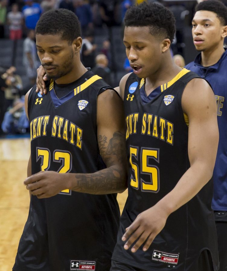 Kent State junior guard Desmond Ridenour and junior guard Kevin Zabo walk off the court after losing to UCLA, 97-80 during the first-round of the NCAA Tournament at the Golden 1 Center in Sacramento, California, on Friday, March 17, 2017.