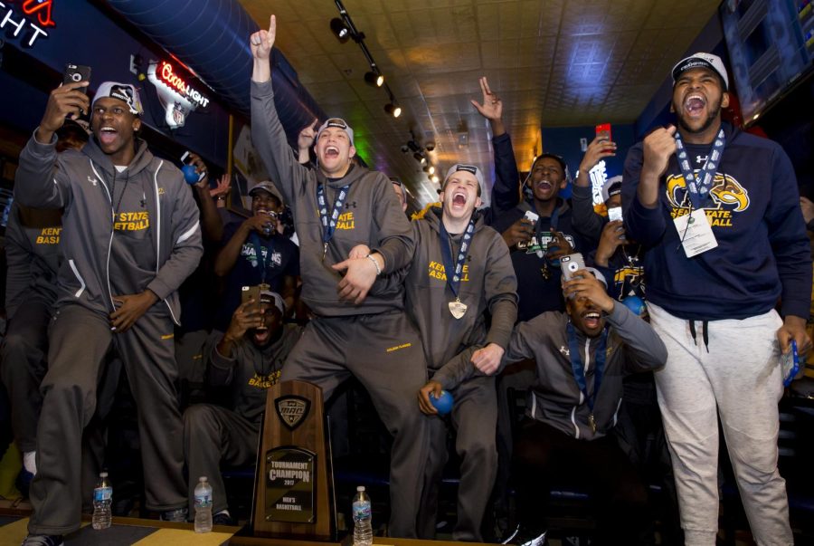 The Kent State mens basketball team reacts to their seeding in the NCAA Tournament at Water St. Tavern in Kent, Ohio, Sunday. Kent State played UCLA as a 14 seed in the South region in 2017.
