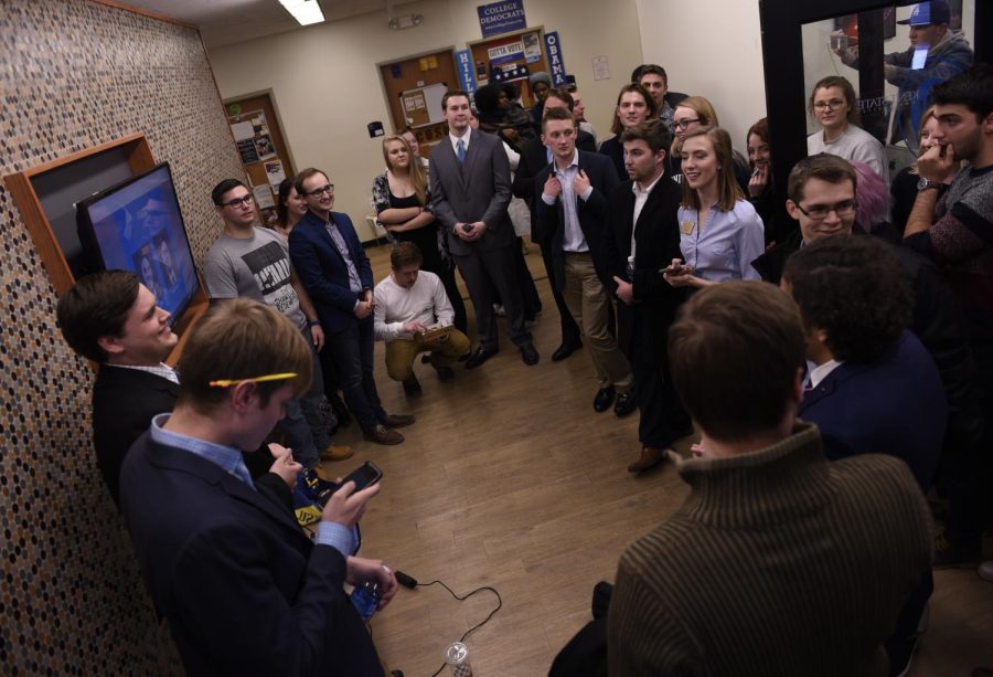 A crowd awaits results of the 2017-18 Kent State Undergraduate Student Government election outside of the USG office in the universitys Student Center on Thursday, March 16, 2017.