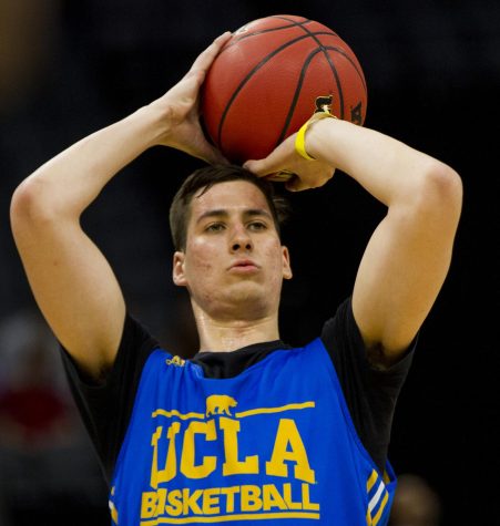 UCLA sophomore forward Alex Olesinski attempts a three pointer during the Bruins open practice at the Golden 1 Center in Sacramento, California on Thursday, March 16, 2017.
