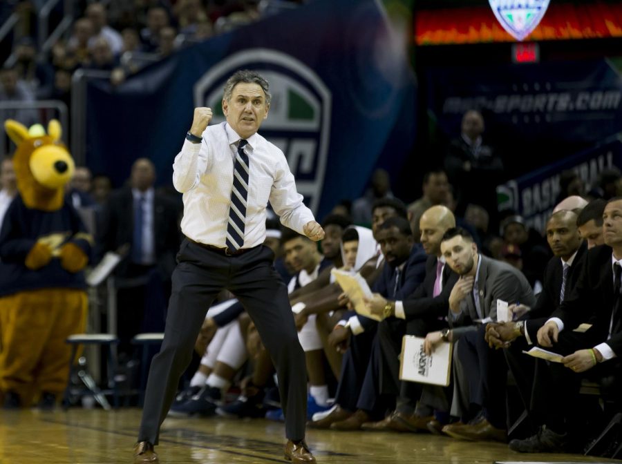 Then-Akron coach, Keith Dambrot, yells at his during the MAC title game at Quicken Loans Arena in Cleveland, Ohio on Saturday, March 11, 2017.