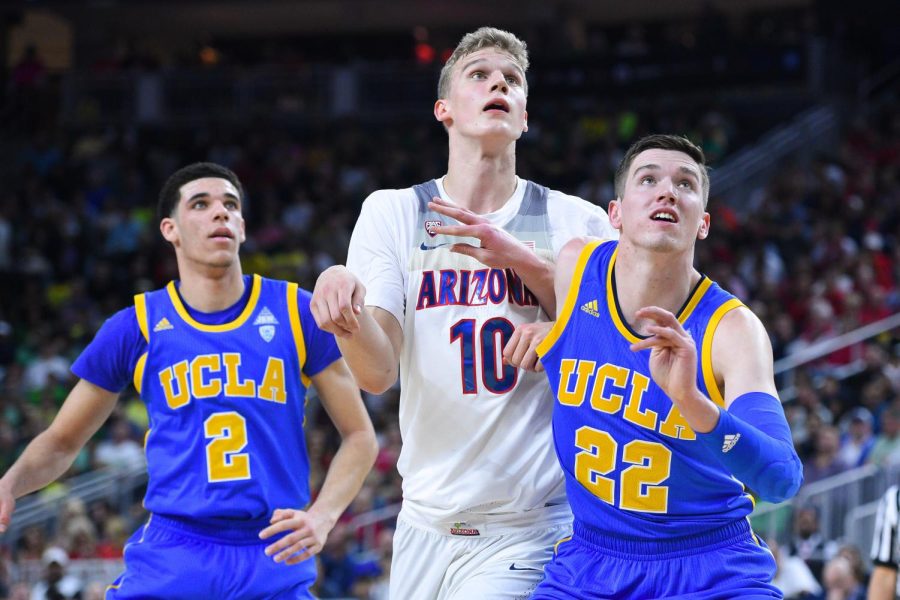 LAS+VEGAS%2C+NV+-+MARCH+10%3A+UCLA+forward+TJ+Leaf+%2822%29+boxes+out+Arizona+forward+Lauri+Markkanen+%2810%29+during+the+semifinal+game+of+the+Pac-12+Tournament+between+the+UCLA+Bruins+and+the+Arizona+Wildcats+on+Friday%2C+at+the+T-Mobile+Arena+in+Las+Vegas%2C+NV.%C2%A0