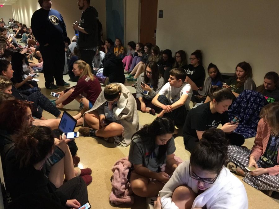 Students crowd the Stopher/Johnson Hall basement on March 1, 2017, during the tornado warning. 