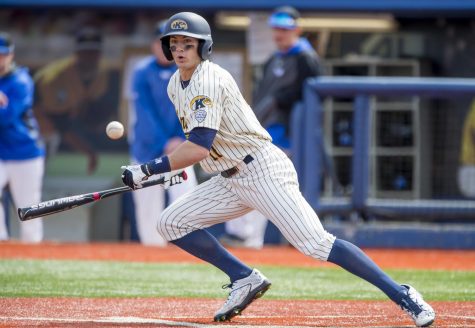Kent State red shirt junior Mason Mamarella bunts down the third-base line in the first inning during the second game of a double-header against University at Buffalo at Schoonover Stadium on Sunday, April 2, 2017. Kent State won 14-0. 