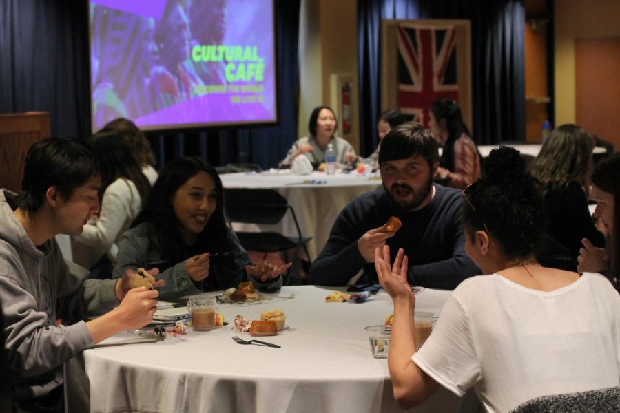 Students enjoy conversation during the Cultural Café’s intermission on Wednesday, April 12, 2017. The last Cultural Café of the semester features two speakers representing their home coutries of Scotland and Japan. A Scottish student and a Japanese student chose two dishes each to represent the food of their culture.