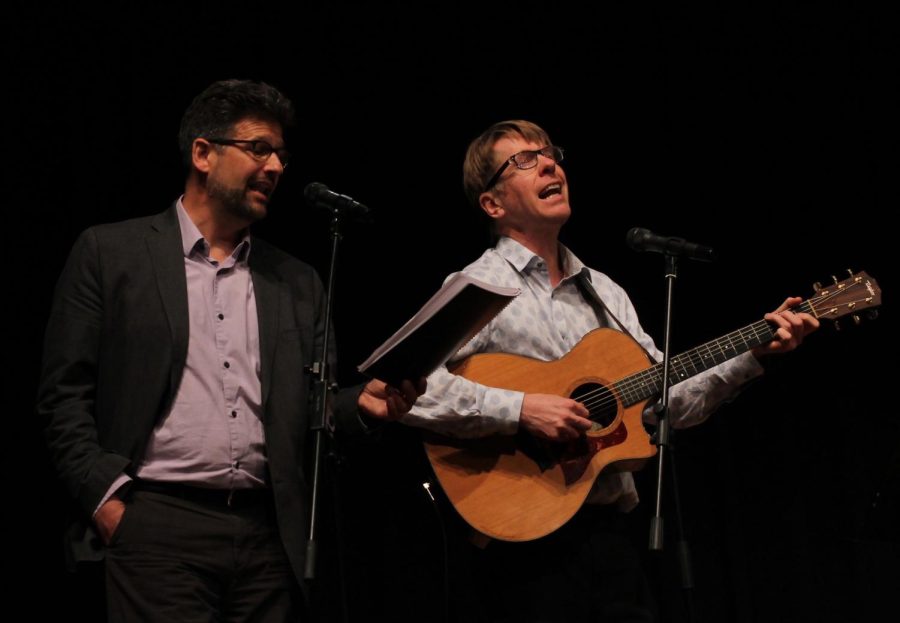 Hal Walker and David Hassler perform a song at the 16th annual Giving Voice poetry event, hosted by the Wick Poetry Center. Third through 12th-grade students attended the poetry reading, and shared the work they created in collaboration with Kent State students in the Wick Outreach Program.