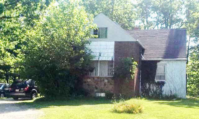 The house at 11489 Ridge Rd. in North Royalton, Ohio, where police found the bodies of Suzanne Taylor and her daughters, Taylor and Kylie Pifer.