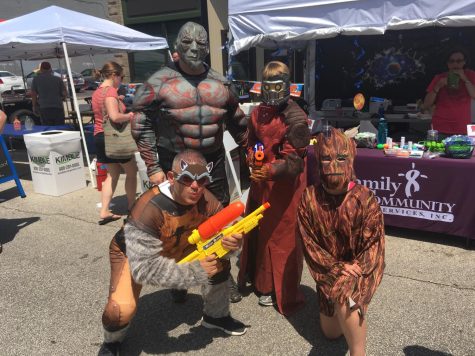 Family and Community Services Inc., dress up as characters from Guardians of the Galaxy as they serve pulled pork and hamburger sliders at their booth on Saturday, June 10, 2017.