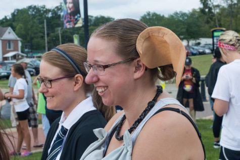 A participant dressed as Dobby stands at the starting line before running the Potterfest 5k on July 28.